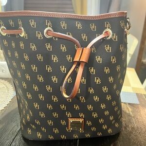 Dooney & Bourke Black and Gold Monogram Bucket Bag